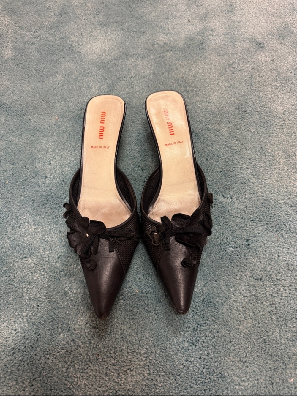 Miu Miu Black Leather Pointed Slip-On Mules with Floral Appliqué